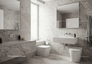 Modern Marble Bathroom with White Fixtures and Natural Light