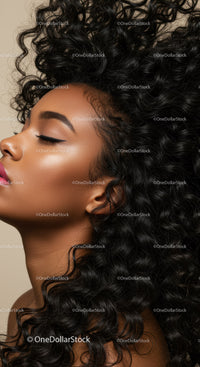 Close Up of Woman with Curly Hair and Glossy Skin