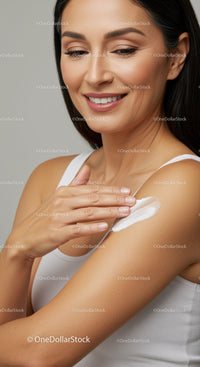 Woman Applying Moisturizer on Shoulder for Healthy Skin