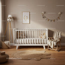 Cozy neutral toned baby nursery with modern crib