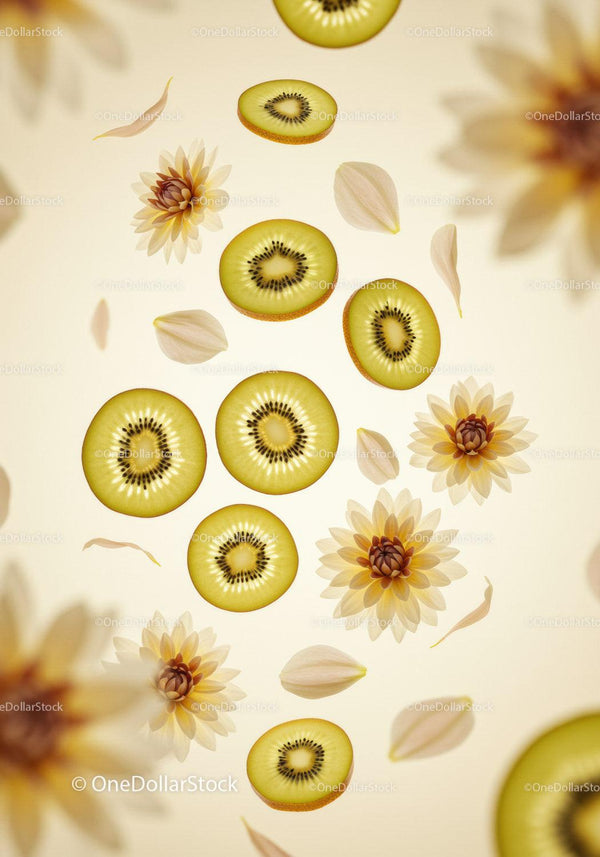 Fresh sliced golden kiwis with delicate flower petals