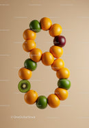 Fruit arrangement forming the letter R on beige background