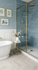 Elegant bathroom with freestanding tub and gold accents