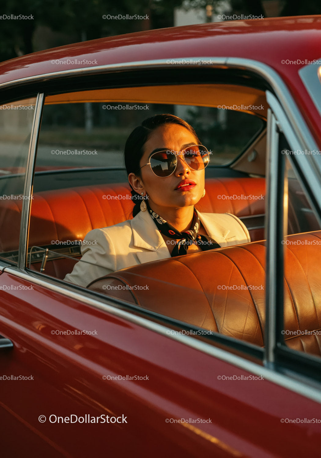 Stylish Woman in Sunglasses Sitting in Vintage Red Car at Sunset