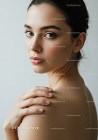 Close-up of a Young Woman with Clear Skin and Expressive Eyes