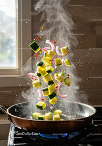 Fresh vegetables sizzling in a hot skillet with steam