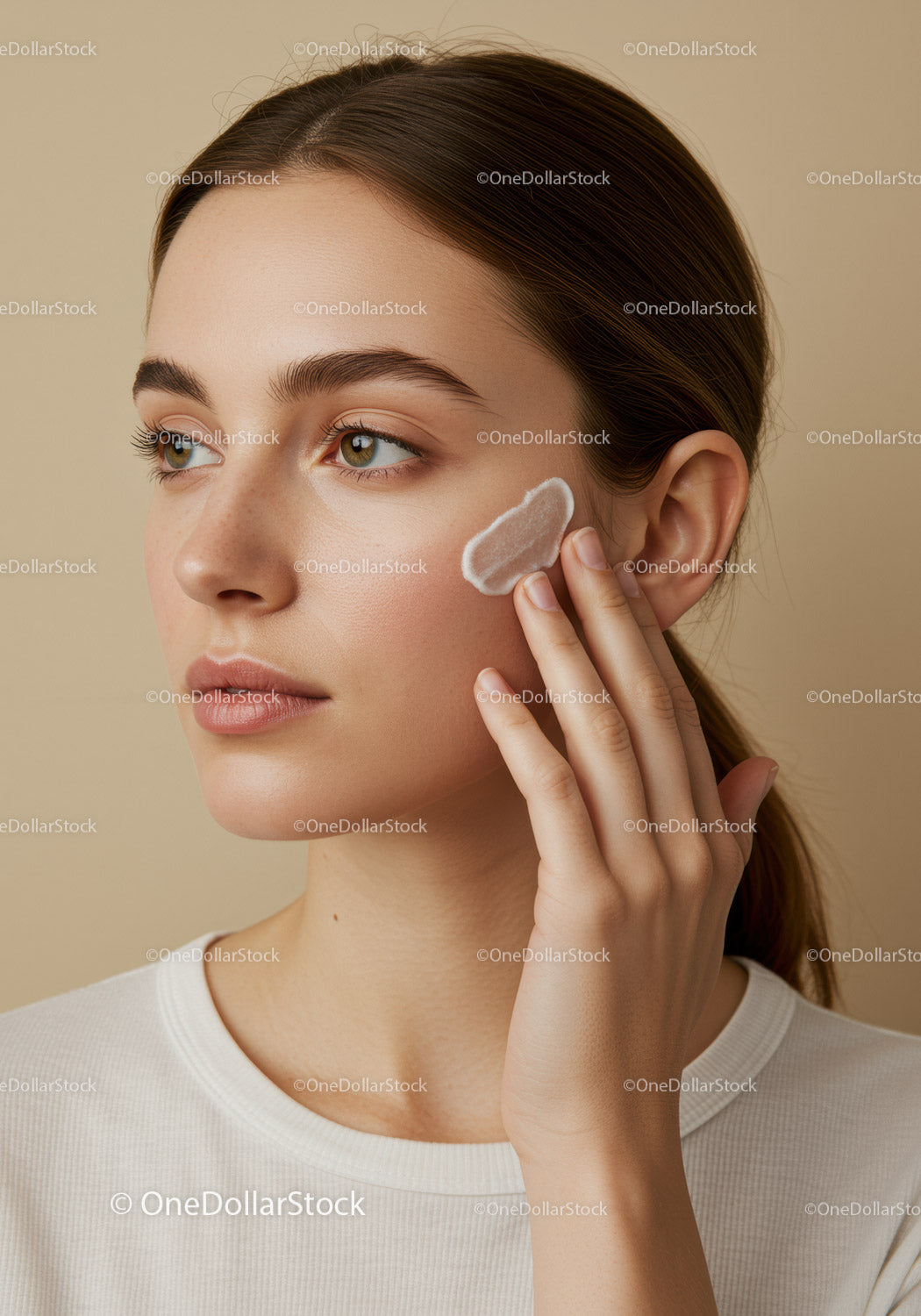 Young Woman Applying Facial Mask for Skincare Routine
