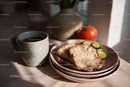 Simple Breakfast Scene with Coffee Bread and Fresh Vegetables