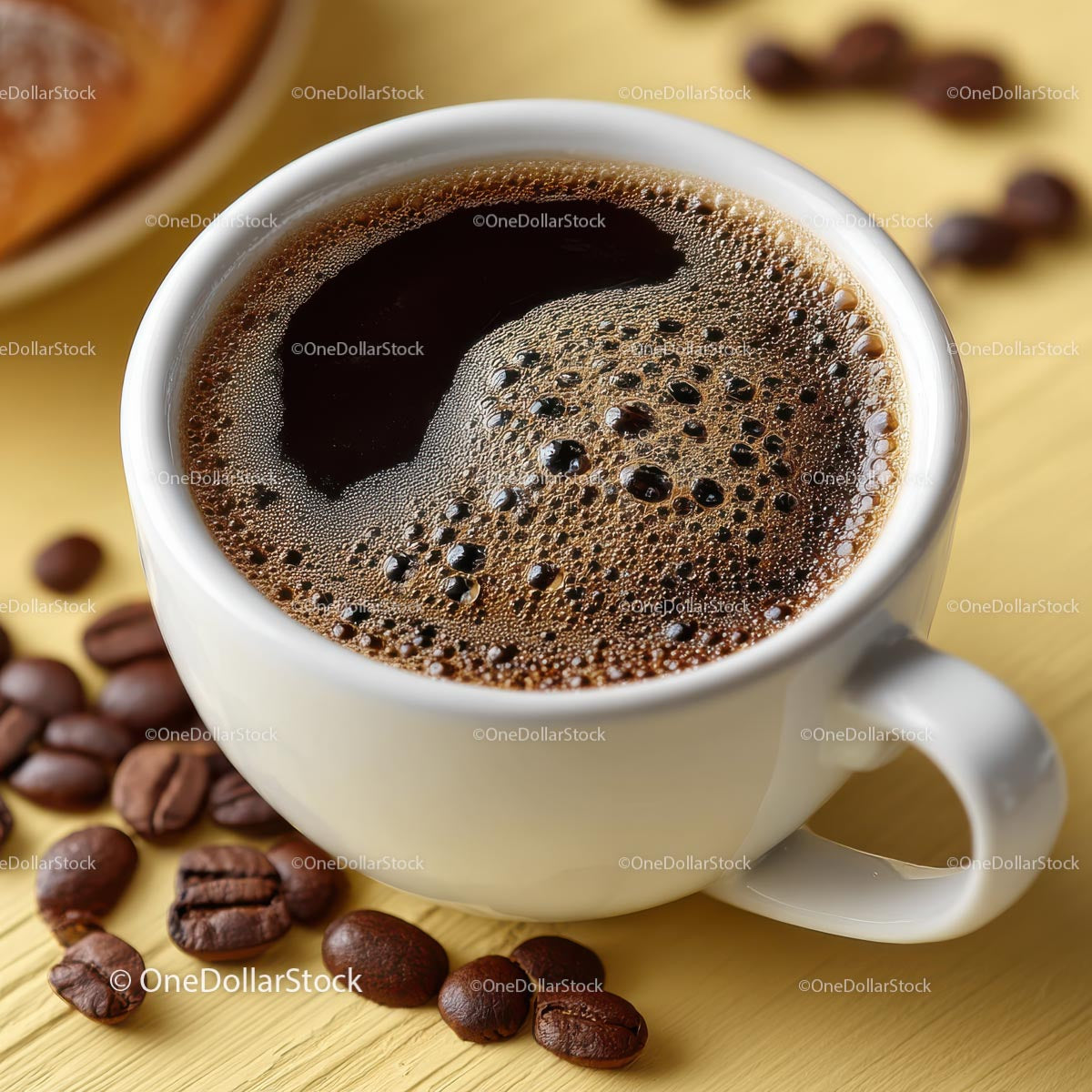 Delicious Coffee in a White Cup with Roasted Beans on Wooden Plate