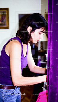 Young woman focused on task in cozy home interior