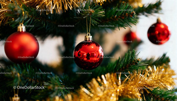 Close up of red baubles on a decorated Christmas tree
