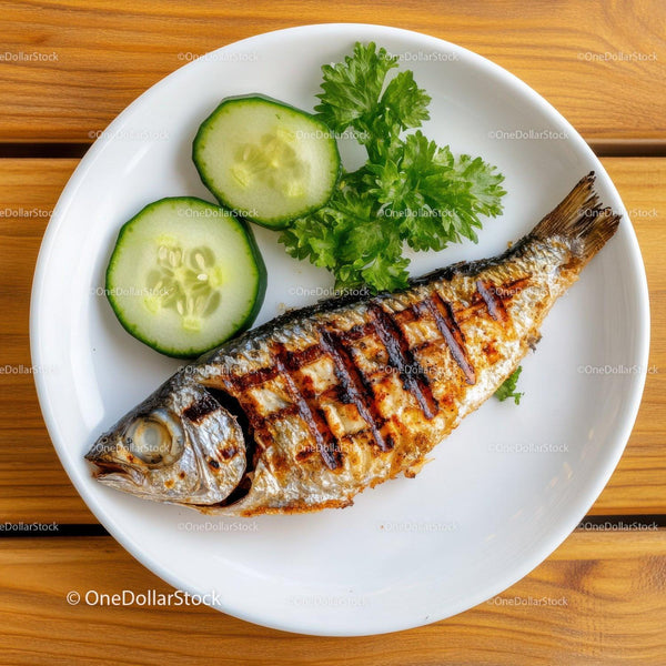 Fresh Grilled Fish with Cucumber Slices and Parsley Garnish