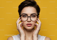 Chic Young Woman in Glasses with Bold Expression on Bright Yellow Background