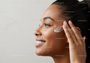 Woman Applying Facial Mist Spray for Glowing Skin