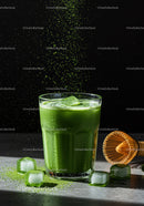 Refreshing iced matcha tea with bamboo whisk and powder