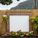 Wooden frame with colorful flowers in tropical garden