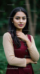 Elegant Woman in Floral Dress with Lush Greenery Background