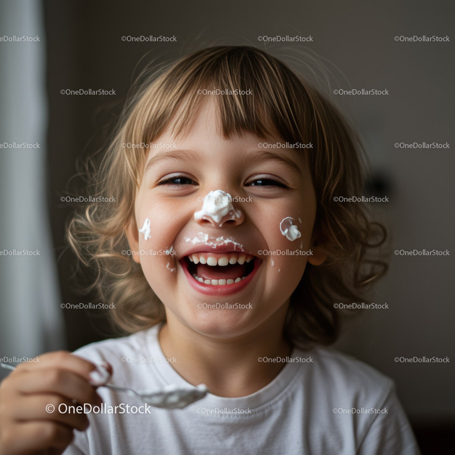 Happy child enjoying a playful yogurt moment