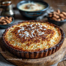 Coconut Tart Baked with Toasted Coconut Flakes on Rustic Wooden Board