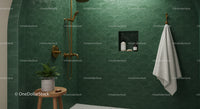 Modern green tiled bathroom with gold fixtures and plants