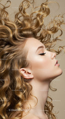 Profile of young woman with voluminous curly hair