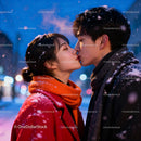 Couple sharing a tender kiss in snowy winter evening
