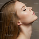 Peaceful young woman with closed eyes in profile