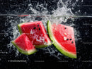 Fresh Watermelon Slices Splashing Water in Vibrant Summer Scene