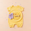 Yellow baby romper with lilac socks and bow headband