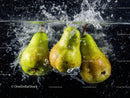 Fresh Green Pears Splashing into Water Underwater Photography