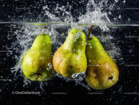 Fresh Green Pears Splashing into Water Underwater Photography