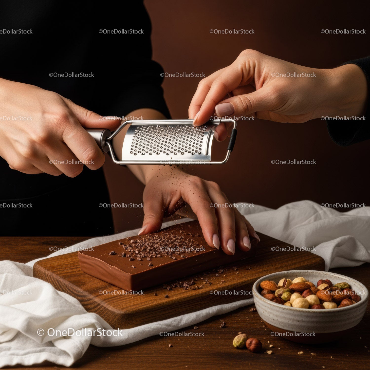 Chocolate Bar with Grating Hand and Nut Bowl in Cozy Kitchen