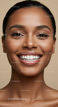 Close up of smiling woman with flawless glowing skin
