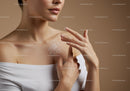 Elegant Woman Touching Shoulder with Smooth Skin in Neutral Tones