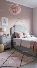 Pink and Gray Children's Bedroom with Cozy Decor and Plush Accessories