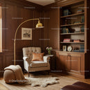 Cozy reading corner with classic armchair and warm decor