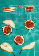 Fresh fig and pear slices floating in clear water