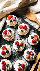 Delicate Meringue Cups with Fresh Berries and Cream