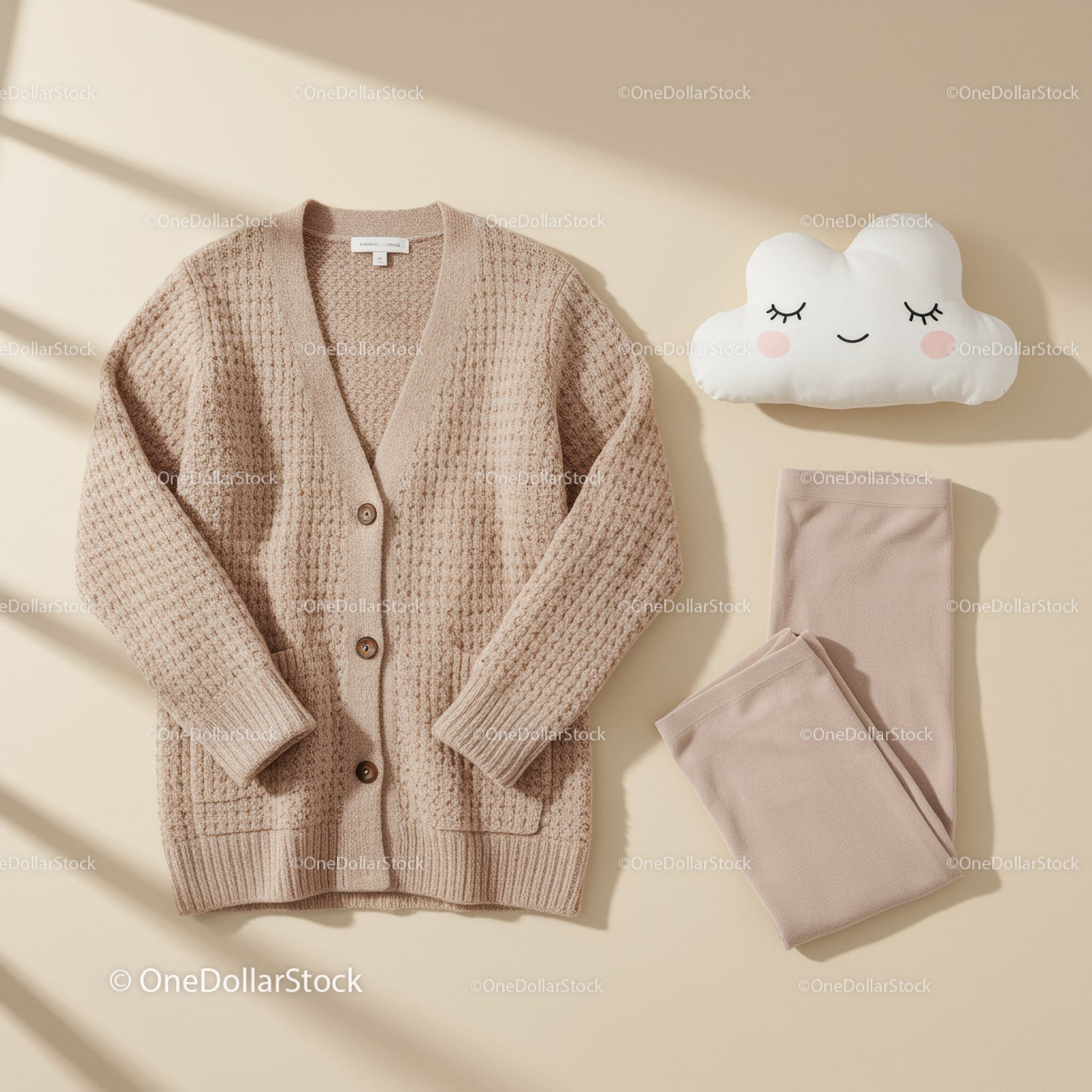 Cozy knit cardigan and soft leggings with plush cloud pillow