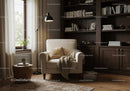 Cozy reading nook with armchair and warm lighting