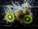 Fresh Green Kiwi Slices and Whole Fruit Splashing into Water