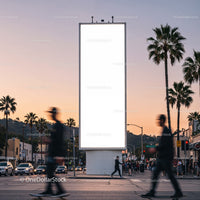 Sunset city street with tall blank billboard and pedestrians