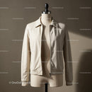 Beige casual jacket displayed on mannequin torso