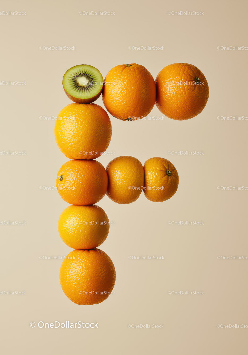 Capital Letter F Composed of Fresh Oranges and Kiwi