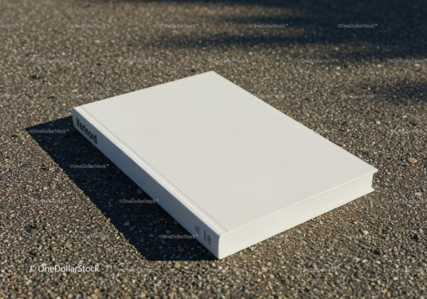 Blank White Hardcover Book on Asphalt Surface JPG Mockup Image