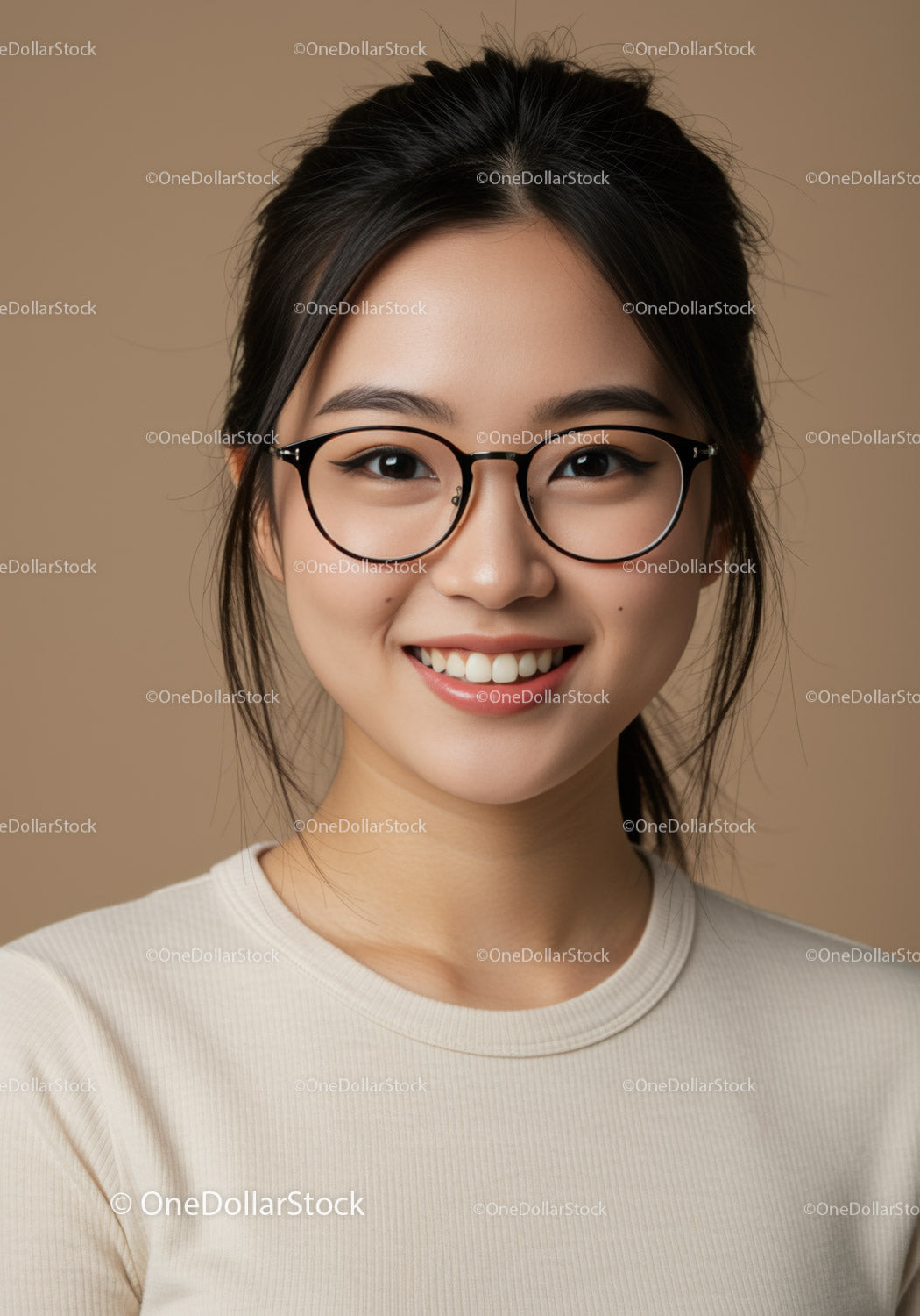 Portrait of a Smiling Young Woman with Glasses in Casual Attire
