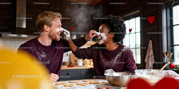 Couple Playfully Baking Heart Cookies Together At Home