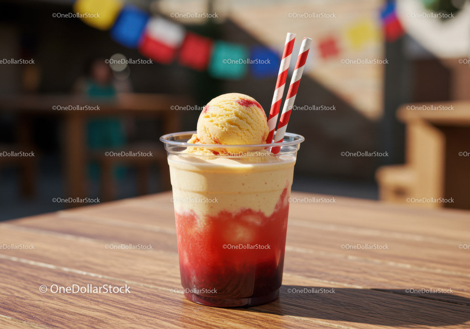 Strawberry Ice Cream in a Clear Cup with Straws on Wooden Table