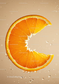 Fresh orange slice submerged in bubbling water
