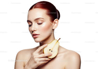 Elegant Portrait of a Woman with Bright Red Hair Holding Pear